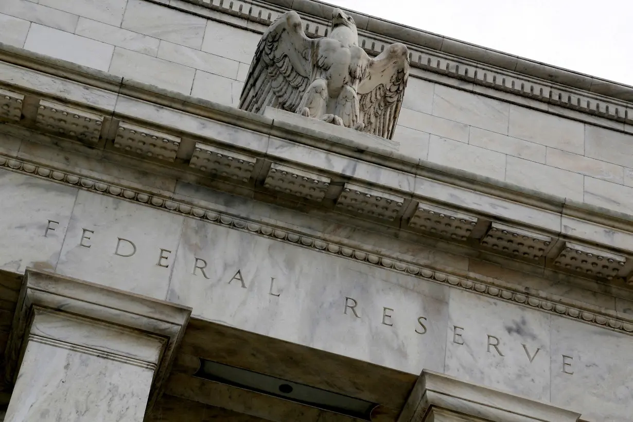 FILE PHOTO: An eagle tops the U.S. Federal Reserve building's facade in Washington