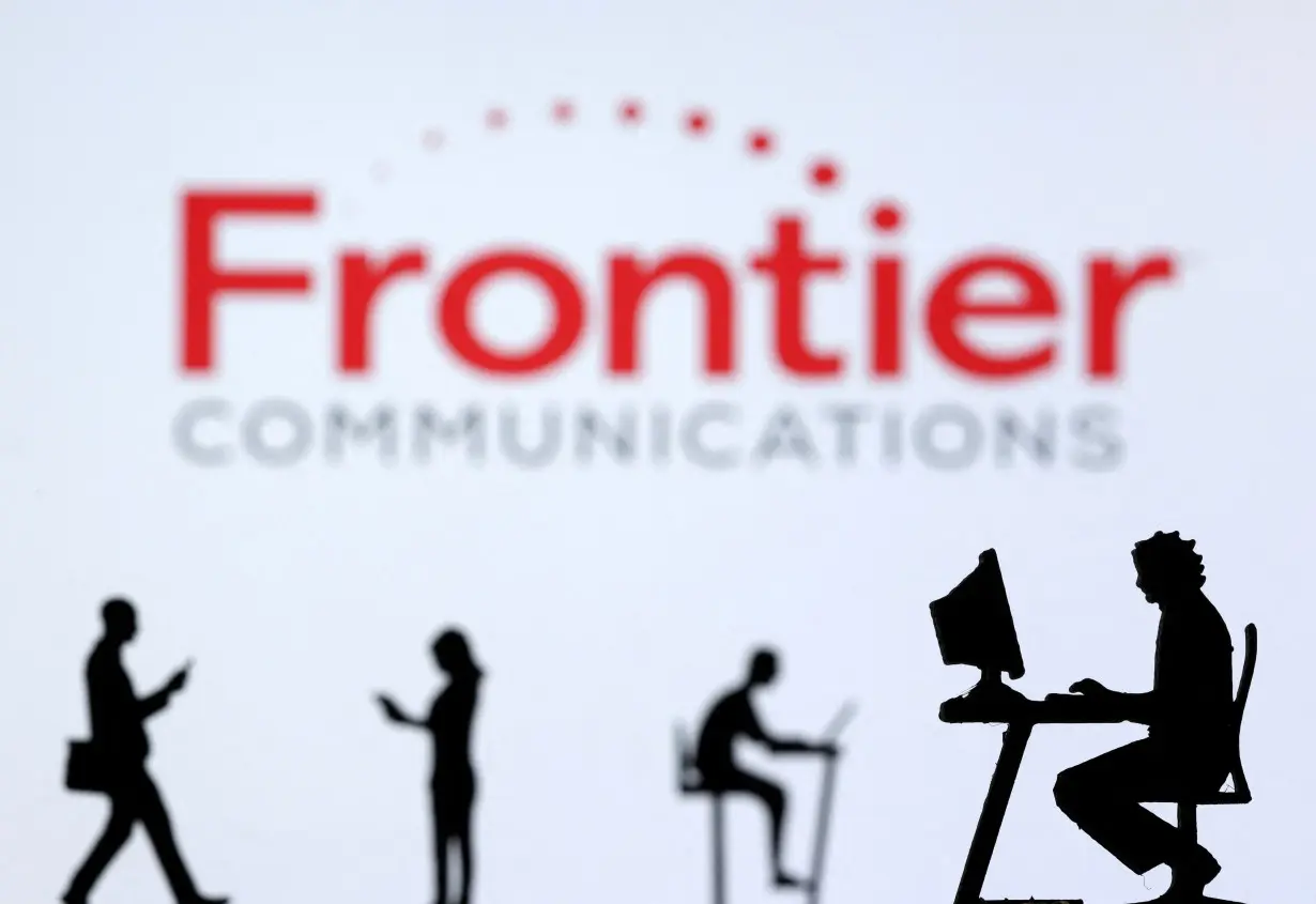 FILE PHOTO: Illustration shows small toy figures with laptops and smartphones in front of displayed Frontier Communications logo