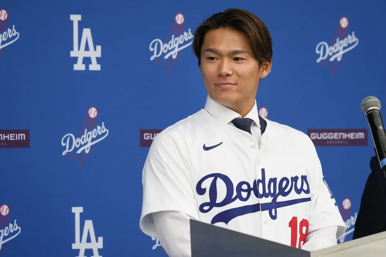 Yoshinobu Yamamoto joins the Los Angeles Dodgers, vows to compete for championships alongside Ohtani