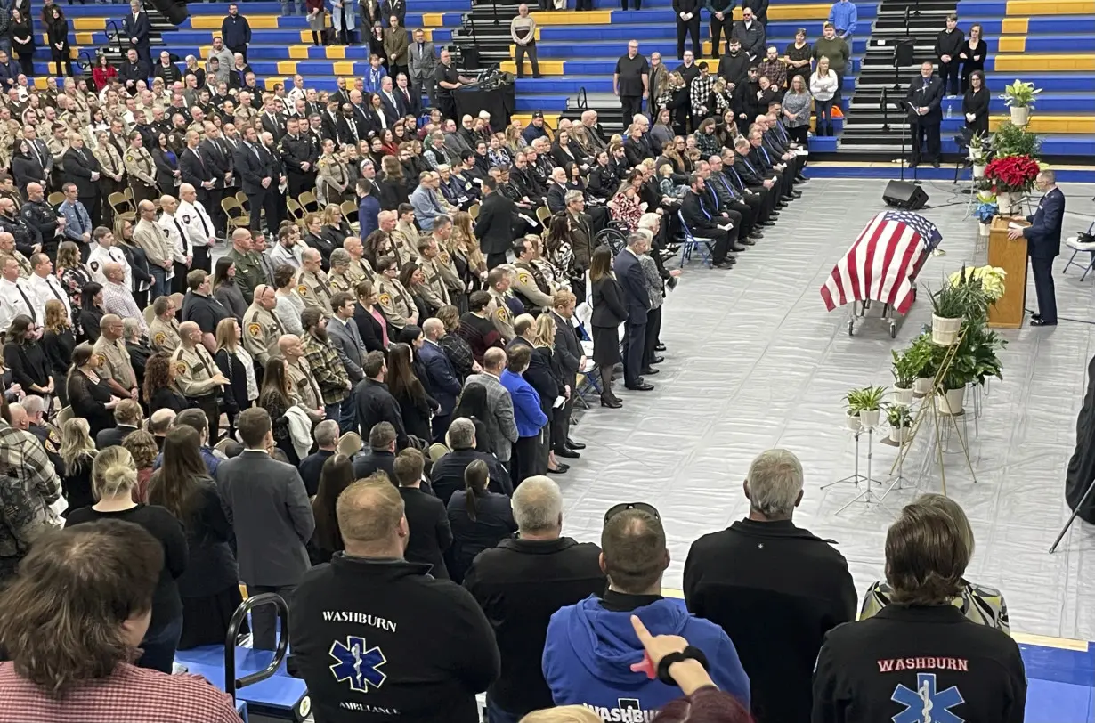 Funeral and procession honors North Dakota sheriff's deputy killed in crash involving senator's son