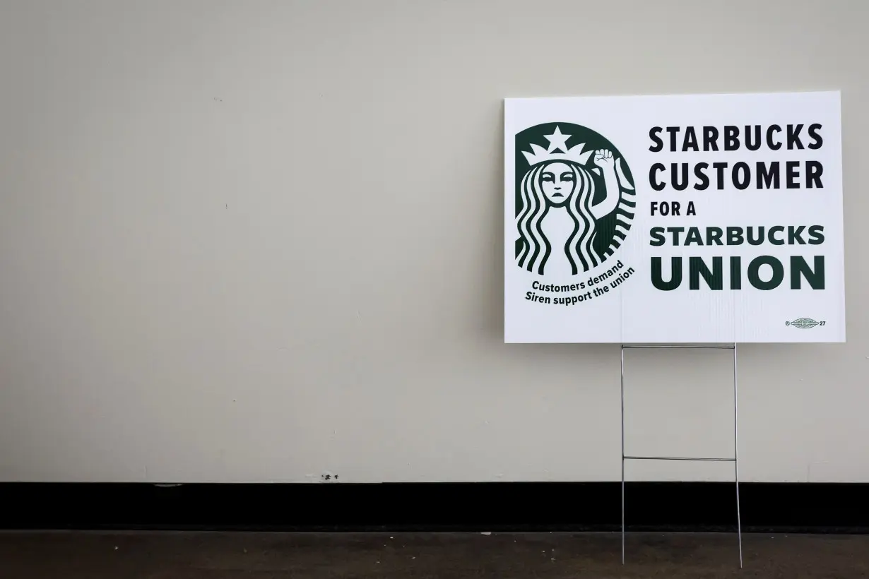 A sign showing support for a Starbucks Union is seen at the Workers United, an affiliate of the Service Employees International Union, offices in Buffalo, New York