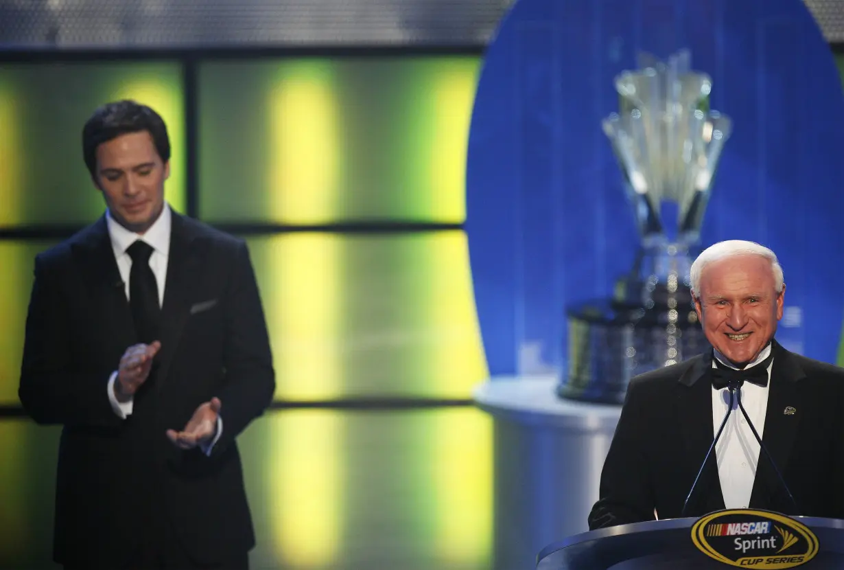 Fellow three-time NASCAR champion Cale Yarborough congratulates Jimmie Johnson on his third NASCAR championship during the 2008 NASCAR Sprint Cup Series Awards Ceremony in New York