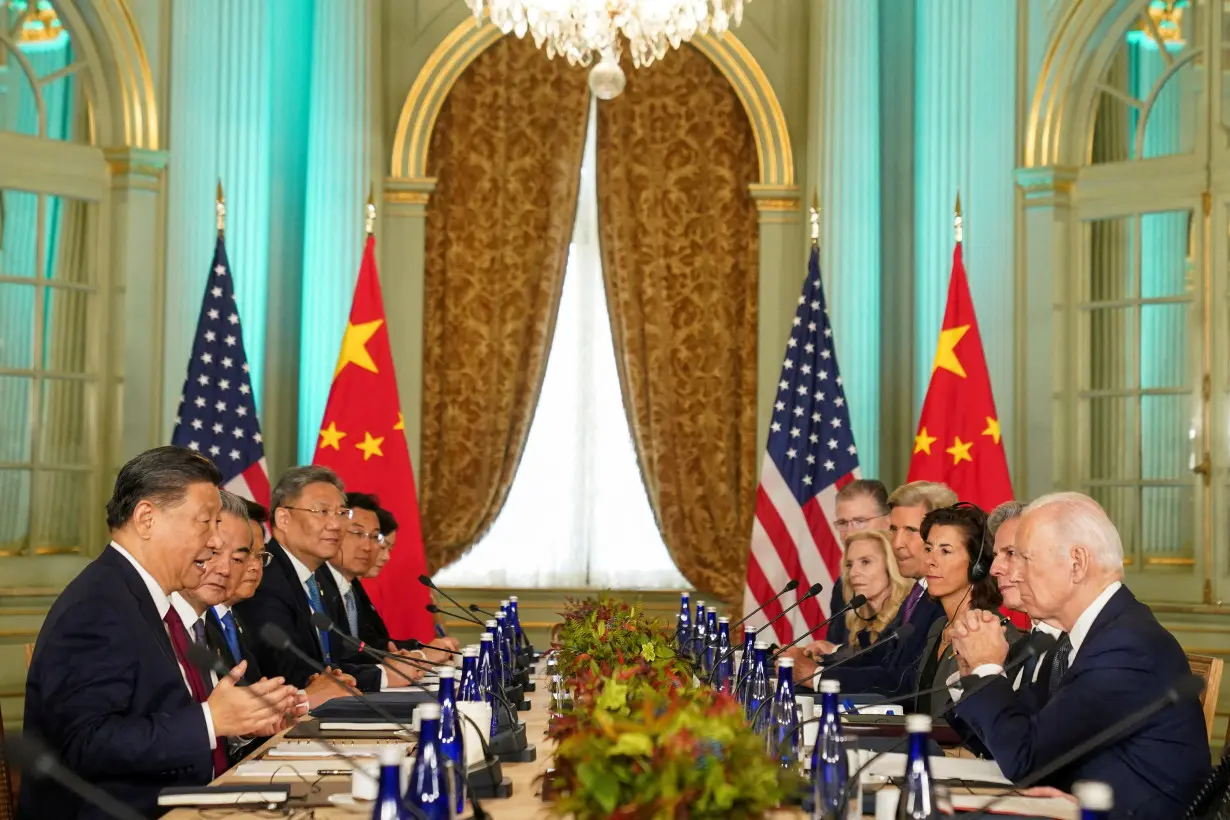 FILE PHOTO: U.S. President Joe Biden meets with Chinese President Xi Jinping on the sidelines of APEC summit, in Woodside