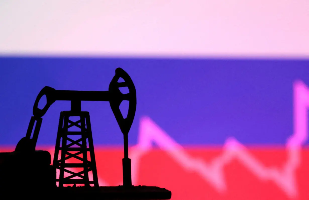FILE PHOTO: Illustration shows Russian flag, oil pump jack and stock graph