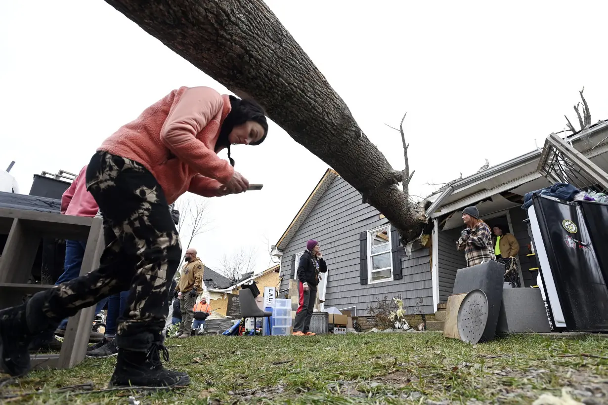 Tennessee residents clean up after severe weekend storms killed 6 people and damaged neighborhoods