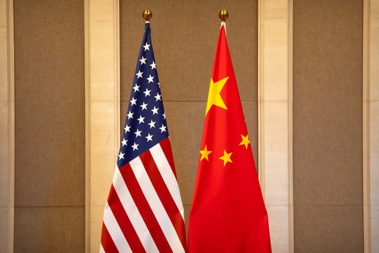 FILE PHOTO: United States and Chinese flags