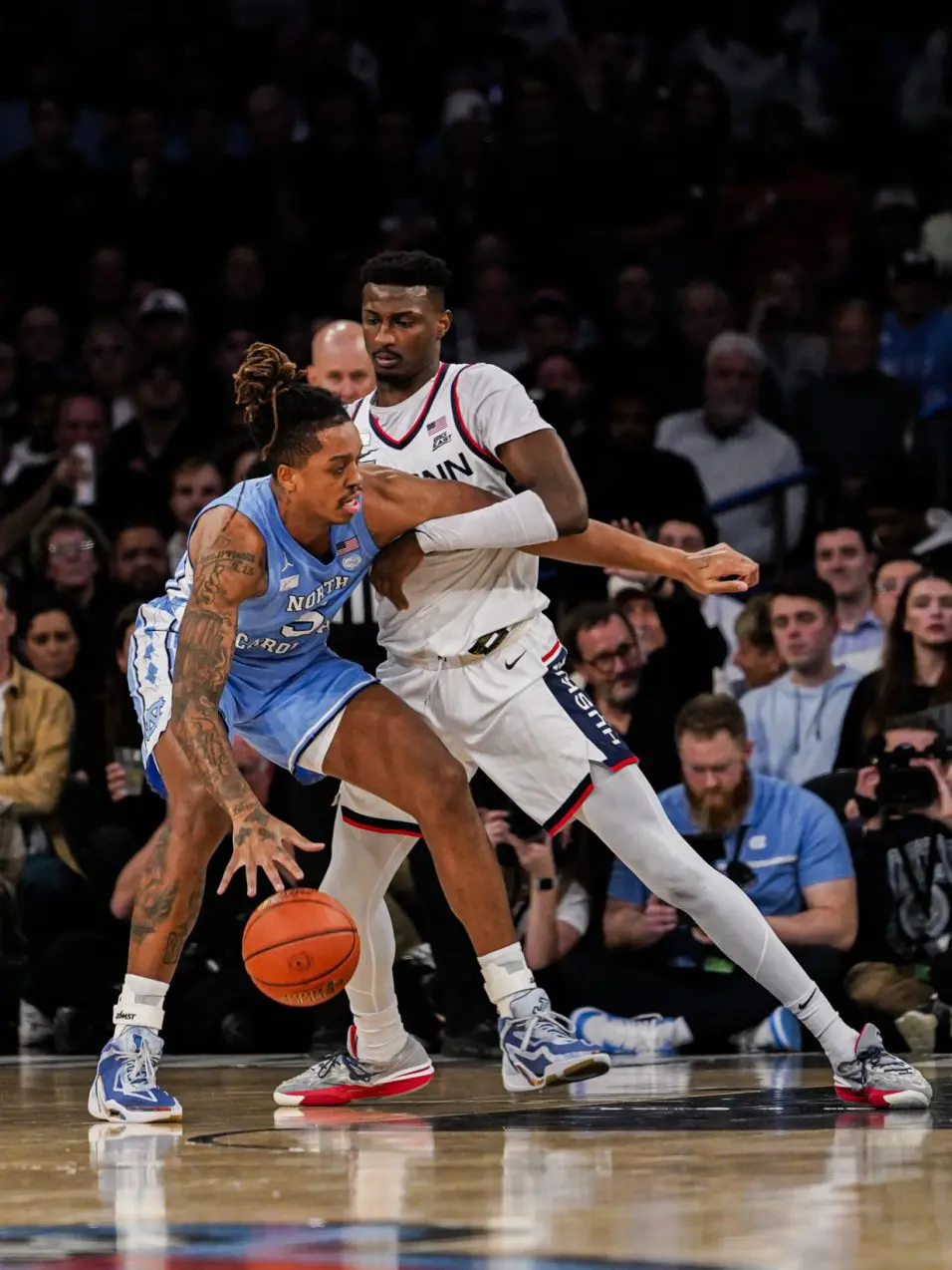 Spencer scores 23 to lead No. 5 UConn past No. 9 North Carolina 87-76 in Jimmy V Classic at MSG