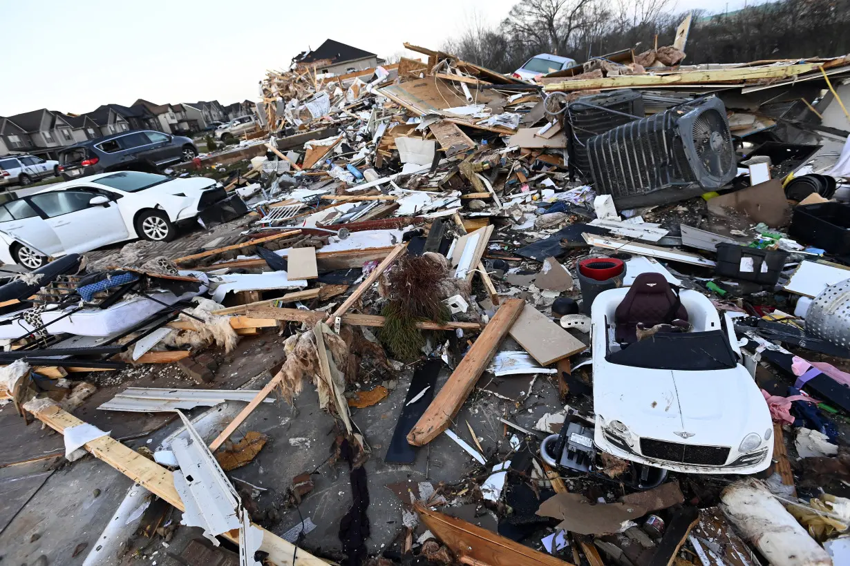 Tennessee residents clean up after severe weekend storms killed 6 people and damaged neighborhoods