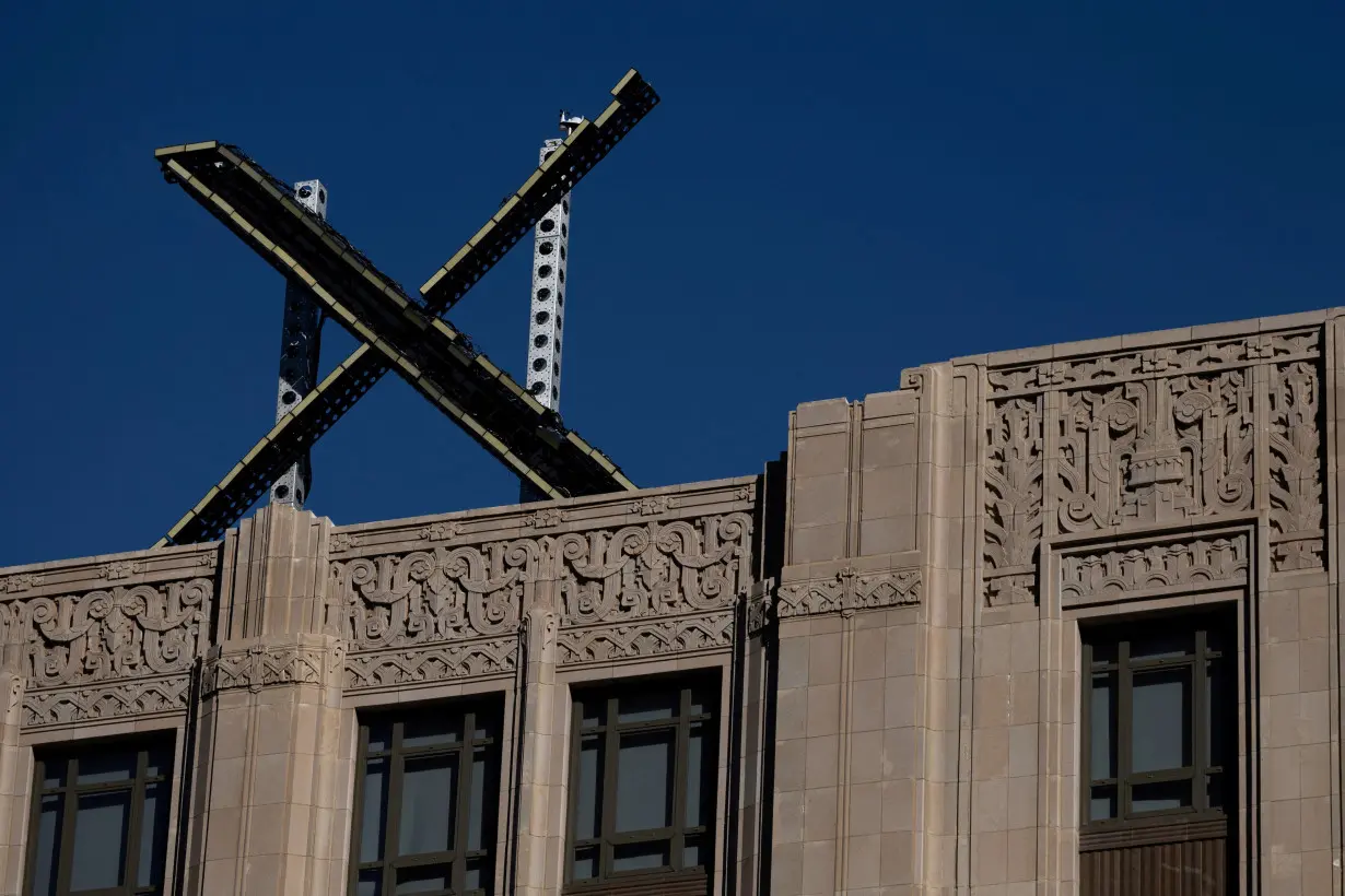 FILE PHOTO: 'X' logo is seen on the top of the headquarters of the messaging platform X, formerly known as Twitter in San Francisco