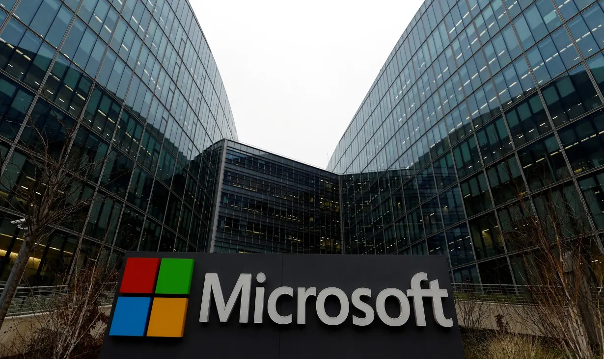 FILE PHOTO: A Microsoft sign at the U.S. tech giant's offices in Issy-les-Moulineaux, near Paris