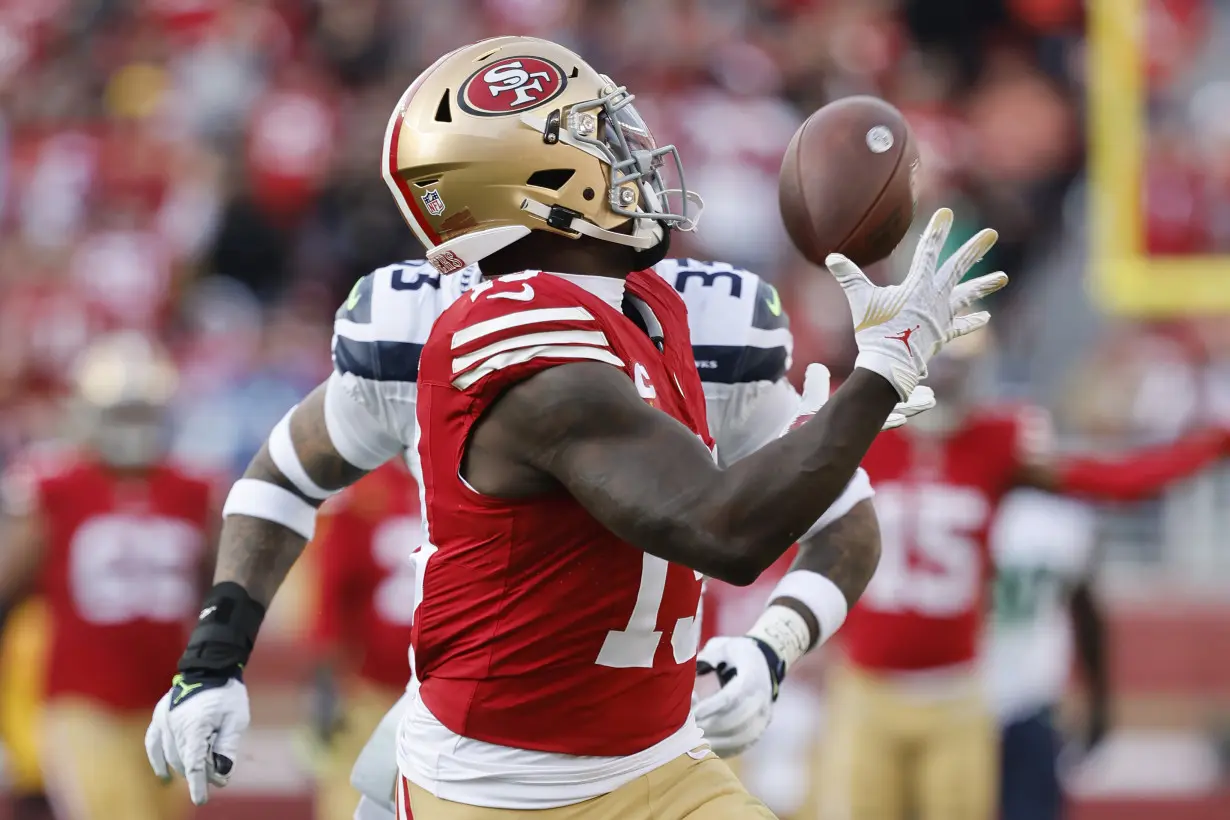 Samuel scores 2 TDs, Purdy throws for career-best 368 yards as 49ers beat Seahawks 28-16