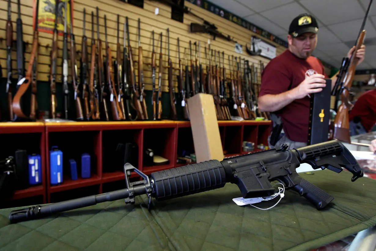 FILE PHOTO: A Palmetto M4 assault rifle is seen at the Rocky Mountain Guns and Ammo store in Parker, Colorado