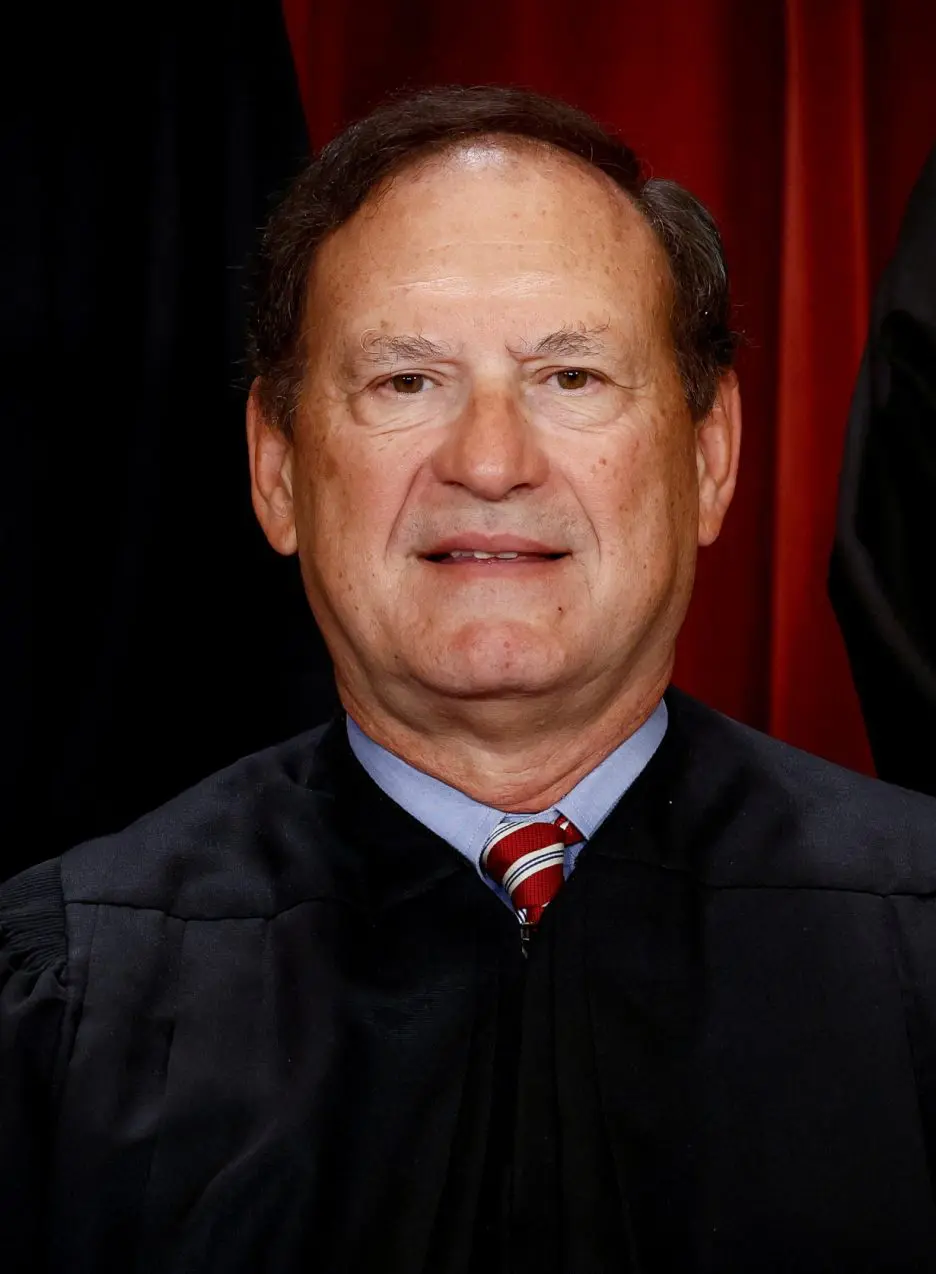 FILE PHOTO: U.S. Supreme Court justices pose for their group portrait at the Supreme Court in Washington