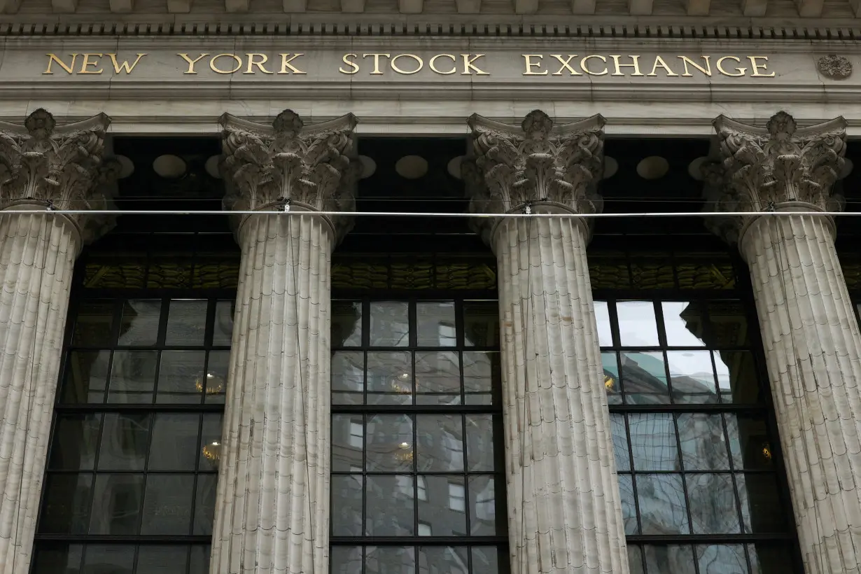 FILE PHOTO: Scenes near Wall Street and the New York Stock Exchange (NYSE), in New York