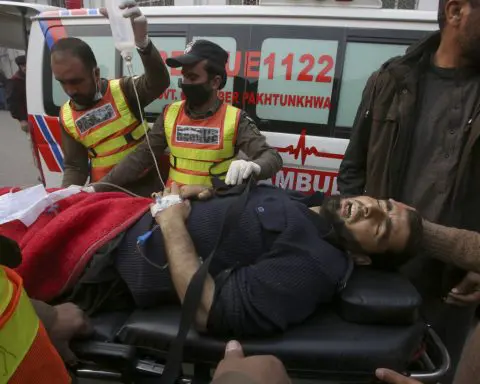 Suspected militants kill 2 police officers assigned to protect polio workers in northwest Pakistan