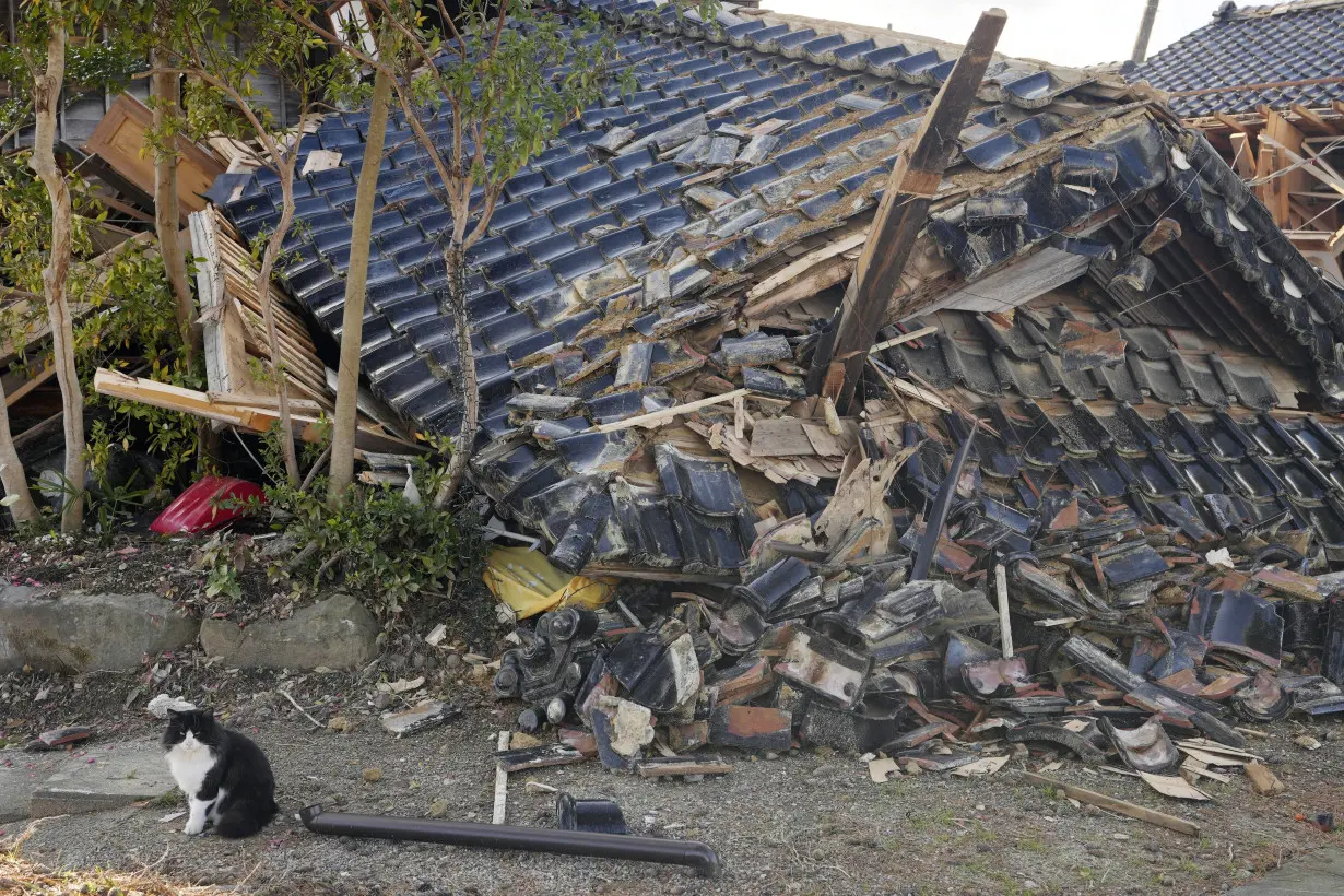 Scenes of loss play out across Japan's western coastline after quake kills 92, dozens still missing