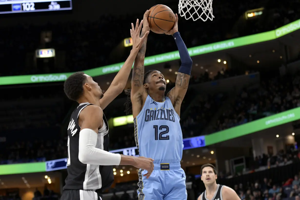 Morant scores 26, dunks on Wembanyama as Grizzlies pull away from Spurs for a 106-98 win