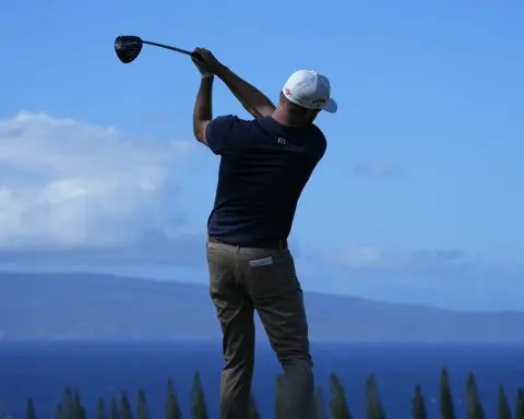 Chris Kirk takes Kapalua lead with final birdie. A dozen players are lined up behind him