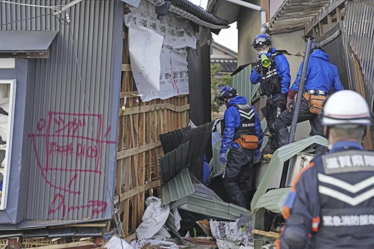 Death toll reaches 100 as survivors are found in homes smashed by western Japan earthquakes