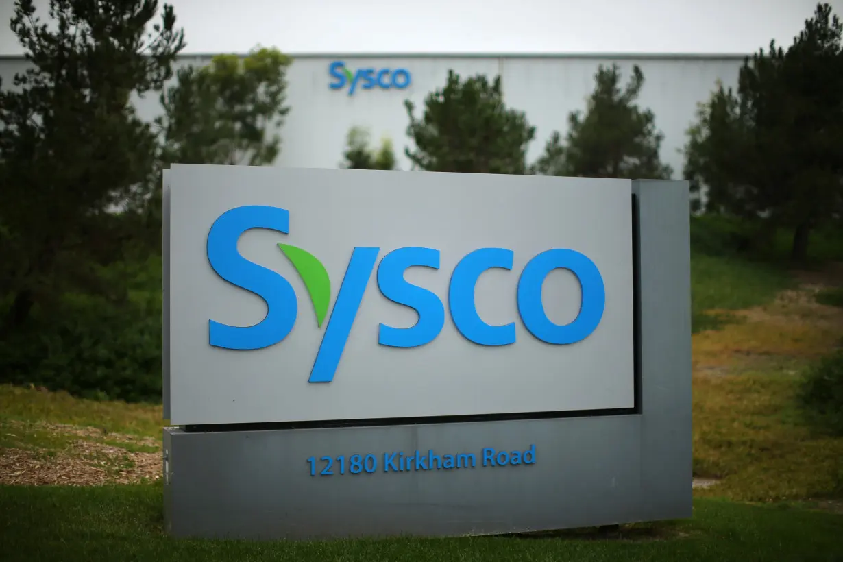 A Sysco sign is shown outside one of their distribution centers in Poway, California