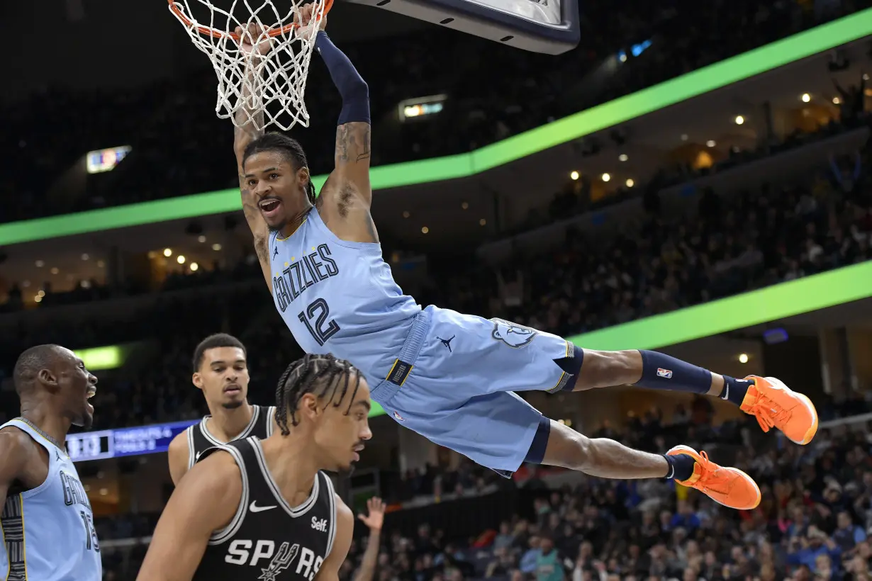 Morant scores 26, dunks on Wembanyama as Grizzlies pull away from Spurs for a 106-98 win