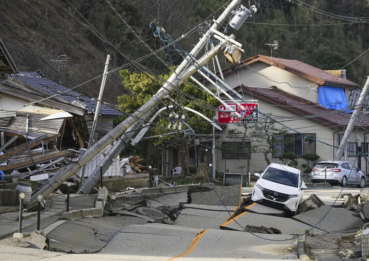 Death toll reaches 100 as survivors are found in homes smashed by western Japan earthquakes