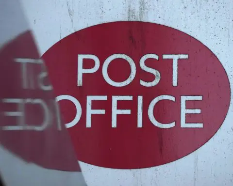 Provider of faulty computer system apologizes to hundreds affected by UK Post Office scandal