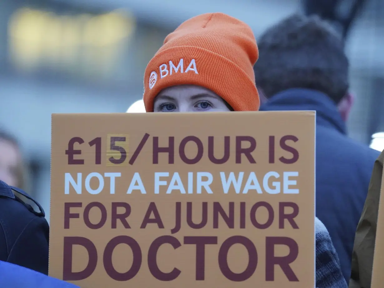 Thousands of doctors in Britain walk off the job in their longest-ever strike