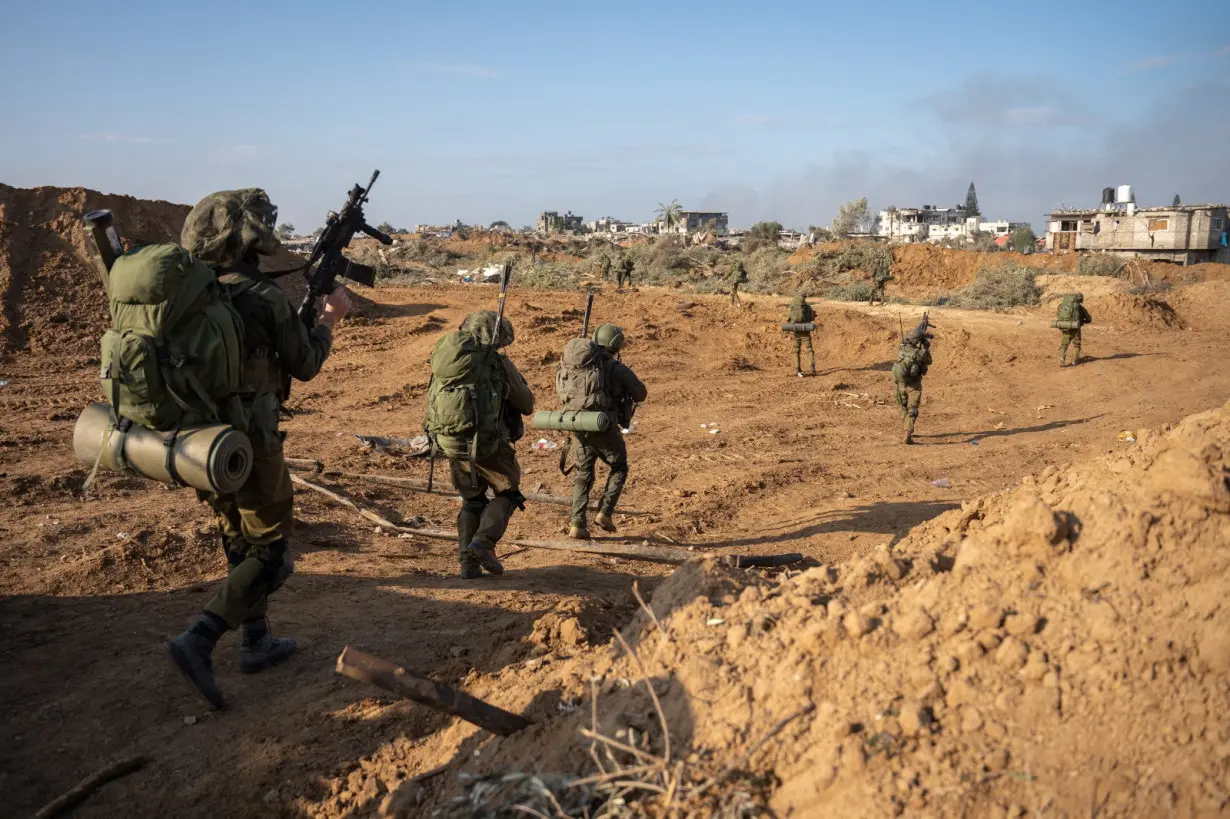 Israeli soldiers take part in a ground operation in Gaza