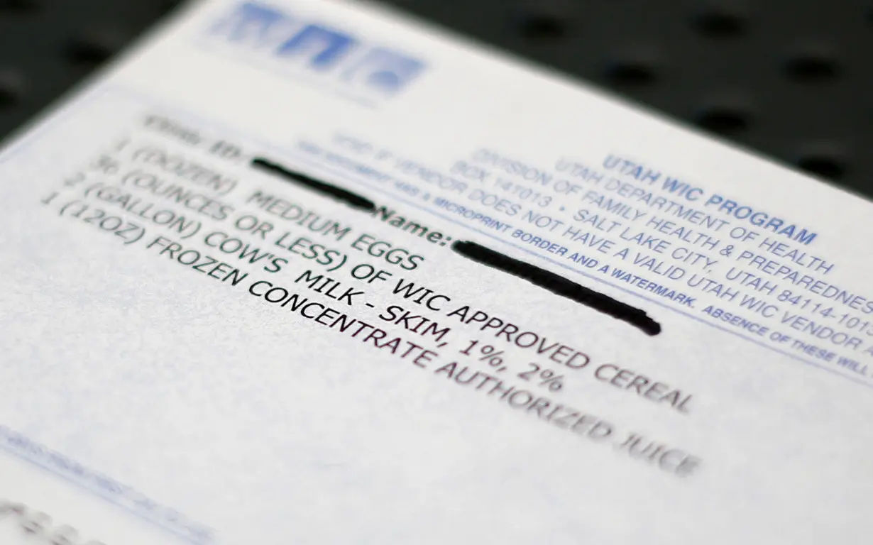 FILE PHOTO: A WIC voucher for food at the Women, Infants and Children (WIC) offices is seen at a Salt Lake County health clinic in South Salt Lake City, Utah