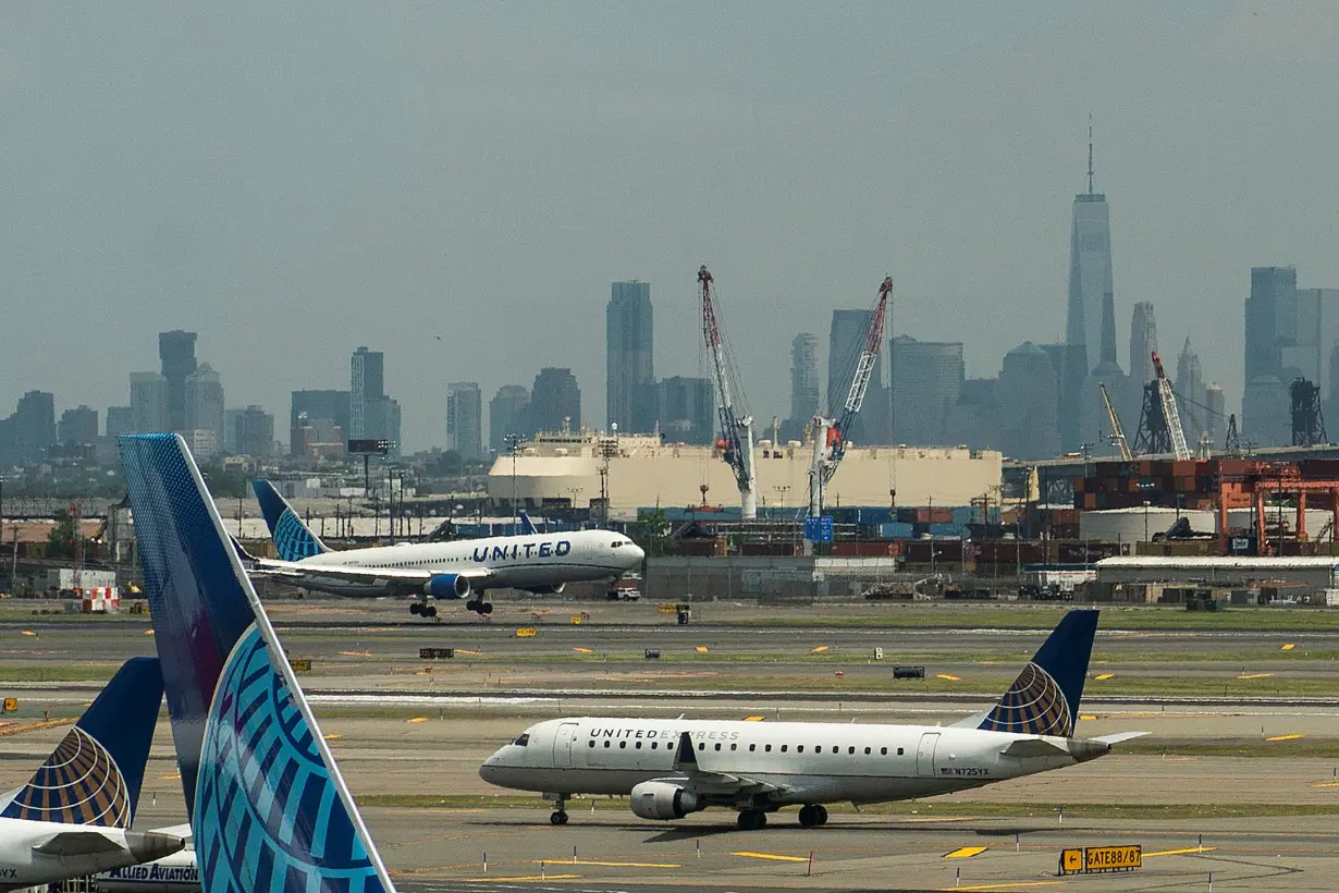 Pilots from United Airlines take part in an informational picket at Newark Liberty International Airport in Newark