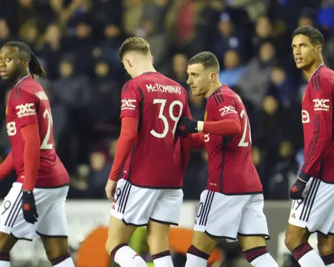 Man United beats 3rd-tier Wigan 2-0 to ease through to 4th round of FA Cup