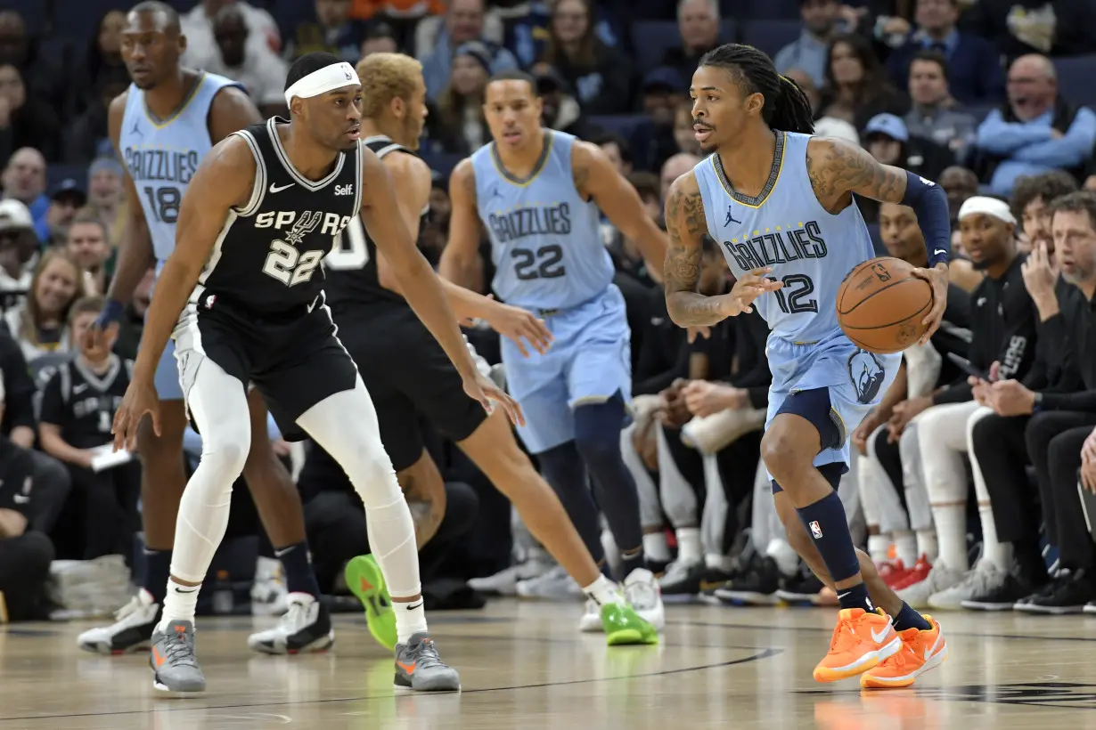 Morant scores 26, dunks on Wembanyama as Grizzlies pull away from Spurs for a 106-98 win