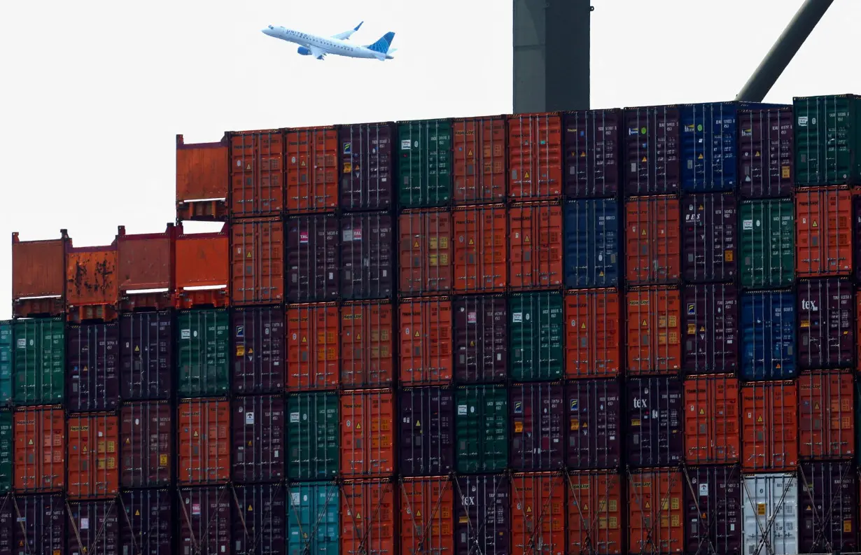 FILE PHOTO: Cargo ship loaded with shipping containers in Port Elizabeth, New Jersey