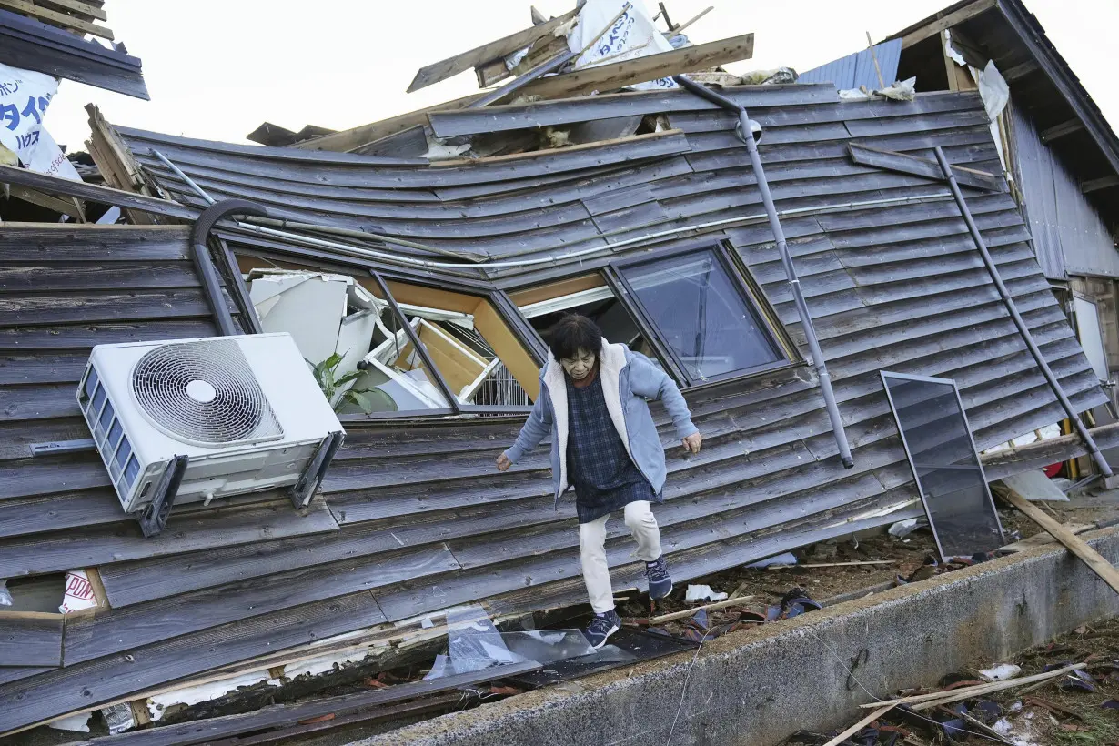 Scenes of loss play out across Japan's western coastline after quake kills 92, dozens still missing