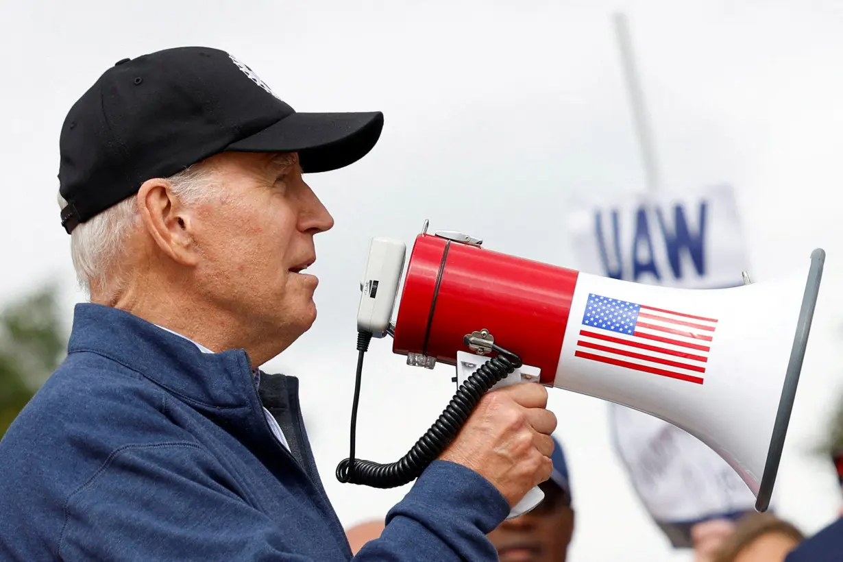 FILE PHOTO: U.S. President Joe Biden joins United Auto Workers picket line in Belleville, Michigan