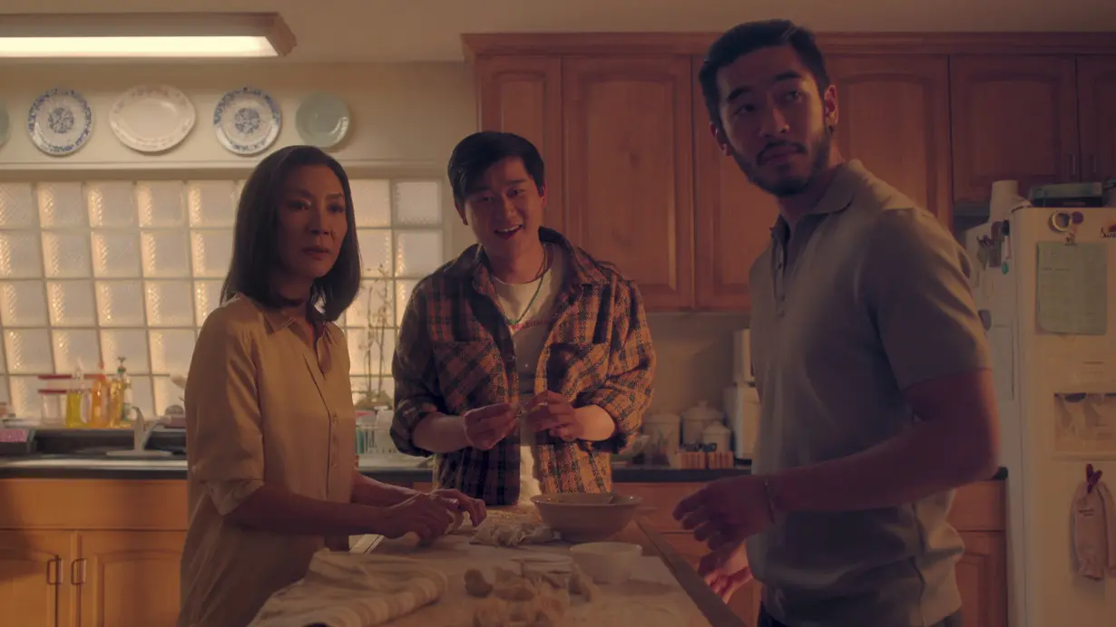 In 'The Brothers Sun,' Michelle Yeoh again leads an immigrant family with dark humor — but new faces