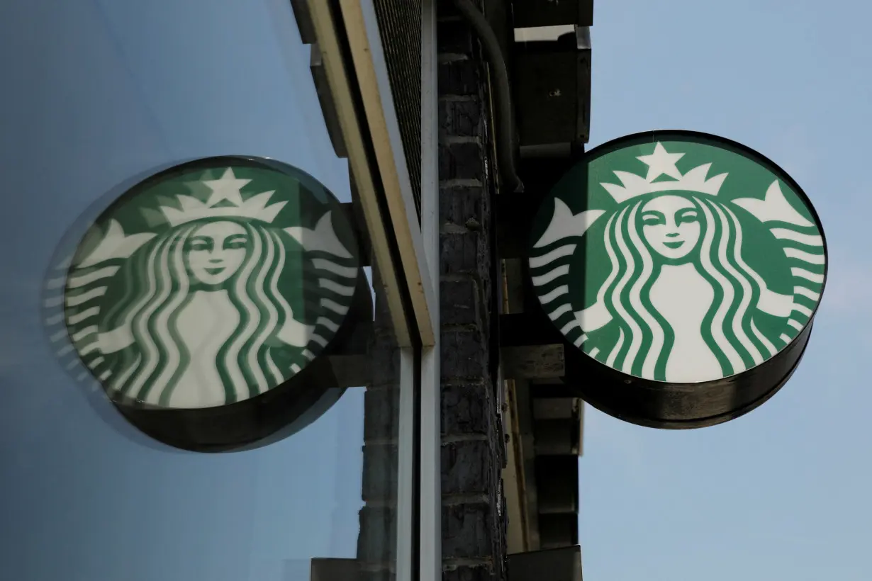 FILE PHOTO: A Starbucks logo hangs in the Brooklyn borough of New York