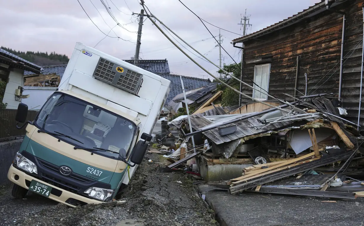 Scenes of loss play out across Japan's western coastline after quake kills 92, dozens still missing