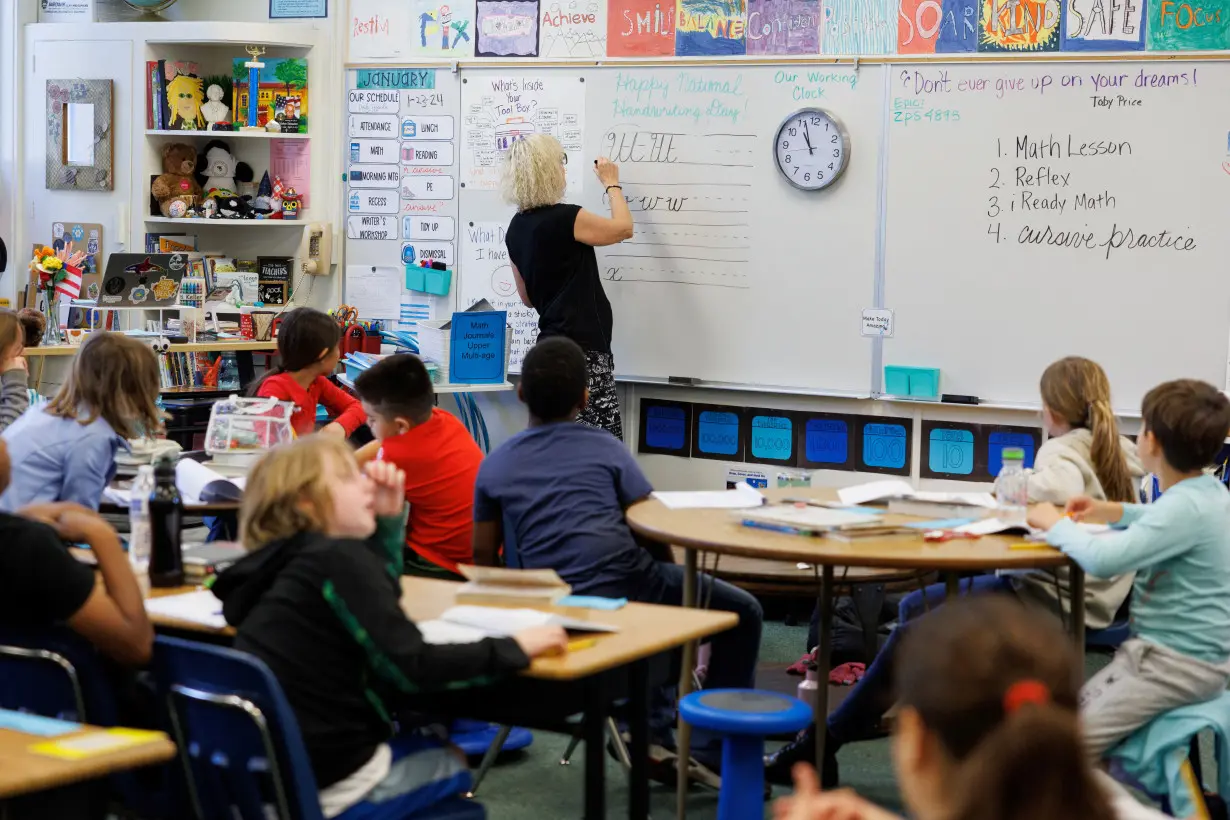 A generation of children who learned to write with their thumbs are now going old school in California