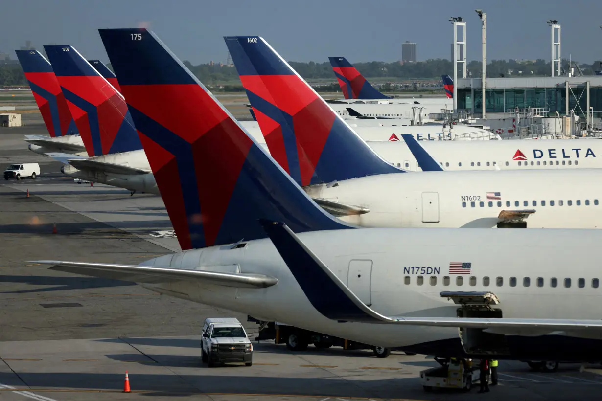 FILE PHOTO: Delta Air Lines planes are seen at John F. Kennedy International Airport on the July 4th weekend in Queens, New York City