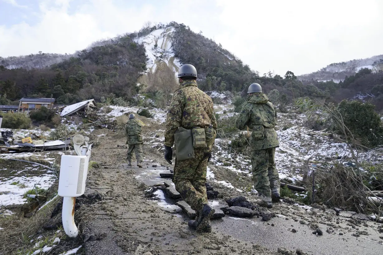 Thousands forced from homes by a deadly Japan earthquake on New Year's face stress and exhaustion