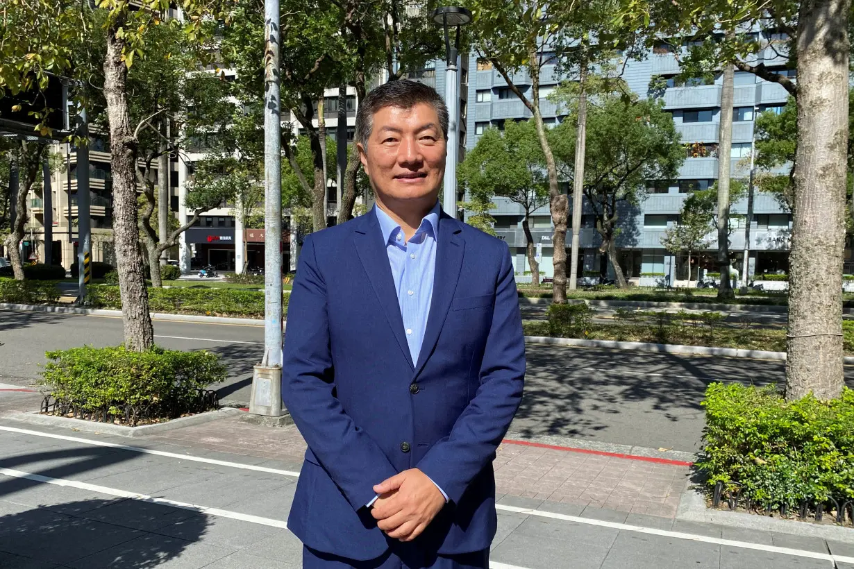 Lobsang Sangay poses for a picture in Taipei