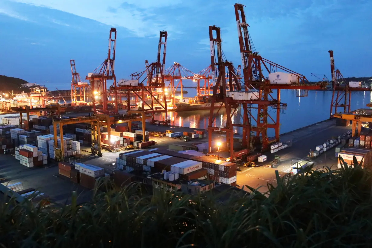 A general view of a container terminal and the port during sunset in Keelung