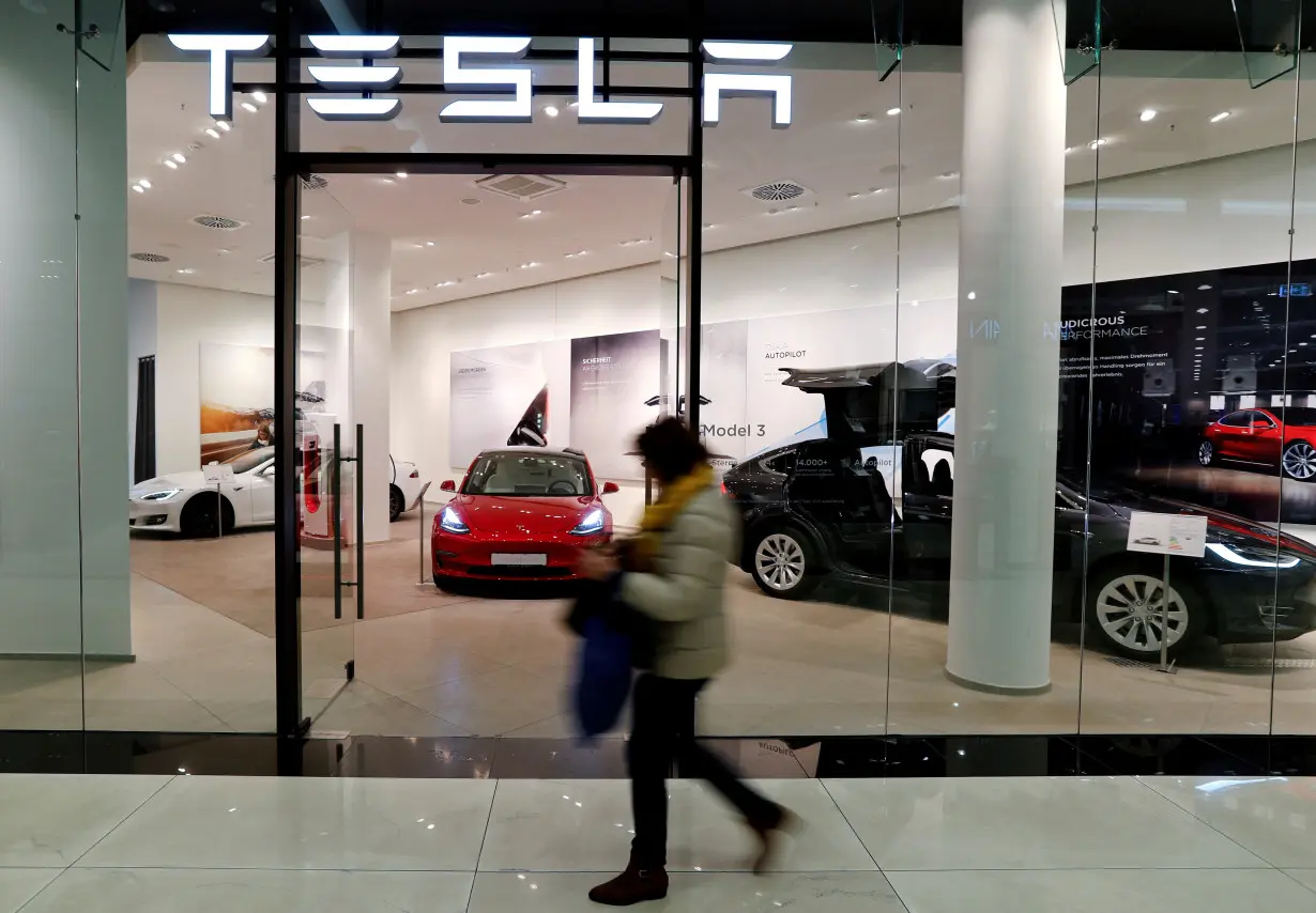 FILE PHOTO: A flagstore shop of electric carmaker Tesla is pictured in Berlin