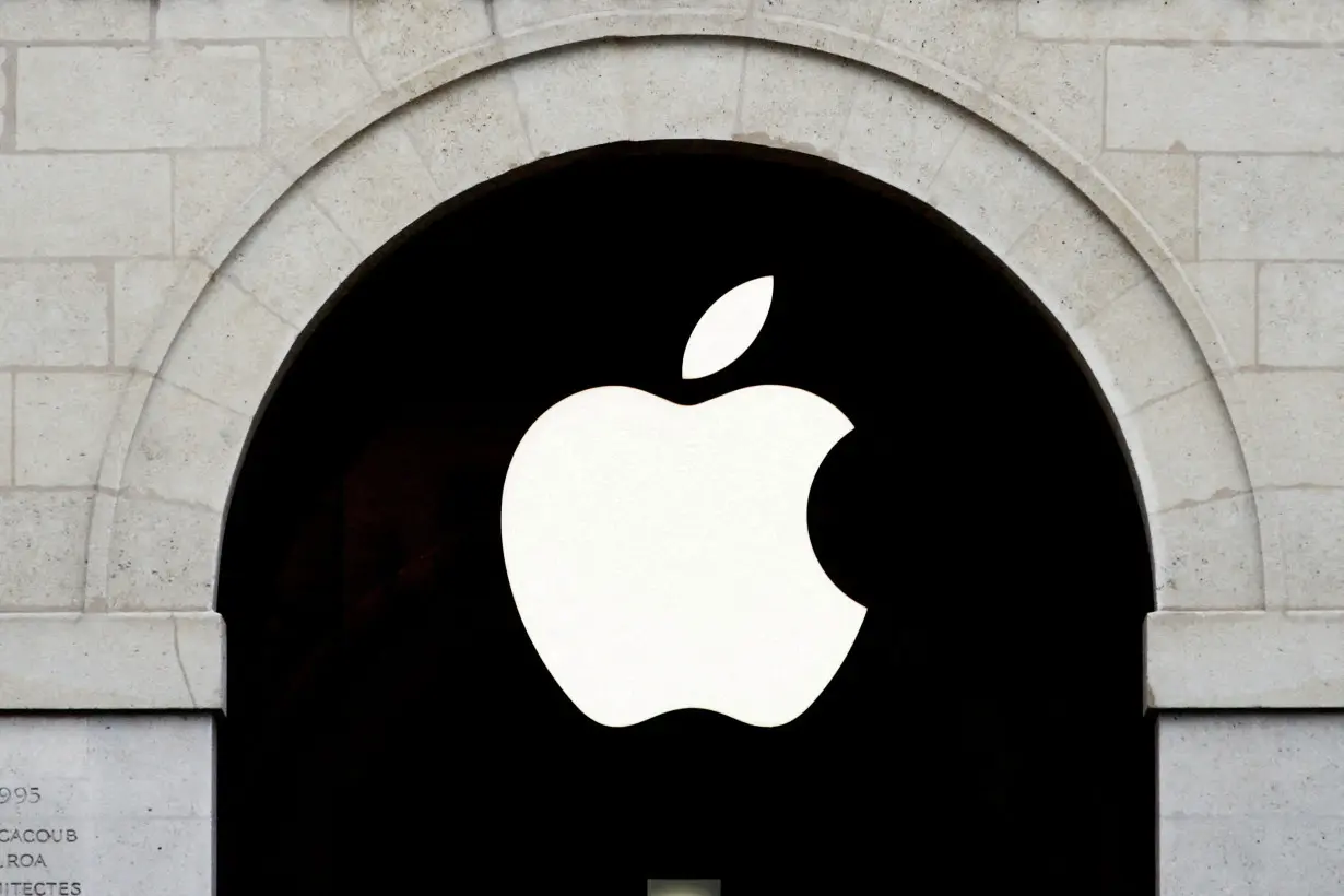 FILE PHOTO: Apple logo is seen on the Apple store at The Marche Saint Germain in Paris