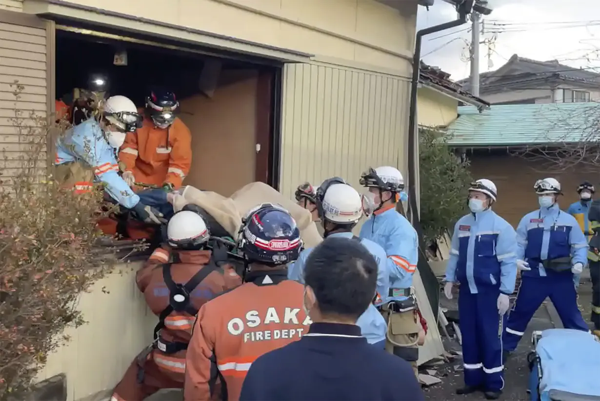 Death toll reaches 100 as survivors are found in homes smashed by western Japan earthquakes