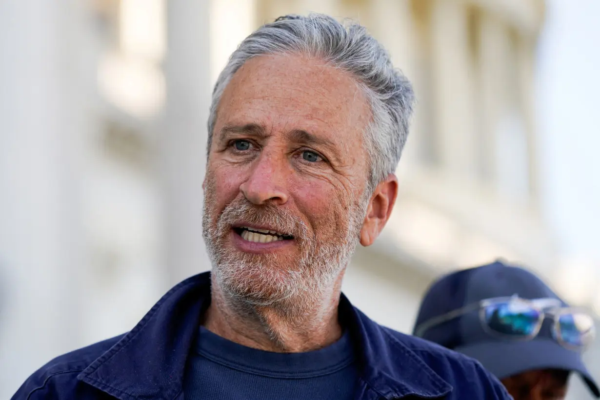 FILE PHOTO: Comedian Jon Stewart leaves the U.S. Capitol after lobbying lawmakers in Washington