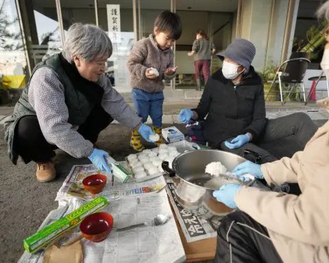 Scenes of loss play out across Japan's western coastline after quake kills 92, dozens still missing