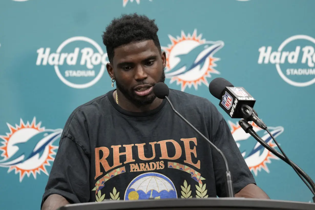 Dolphins' Tyreek Hill returns to practice two days after fire at his home